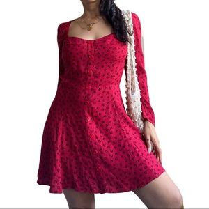 Stunning floral dress with heart shaped neckline.